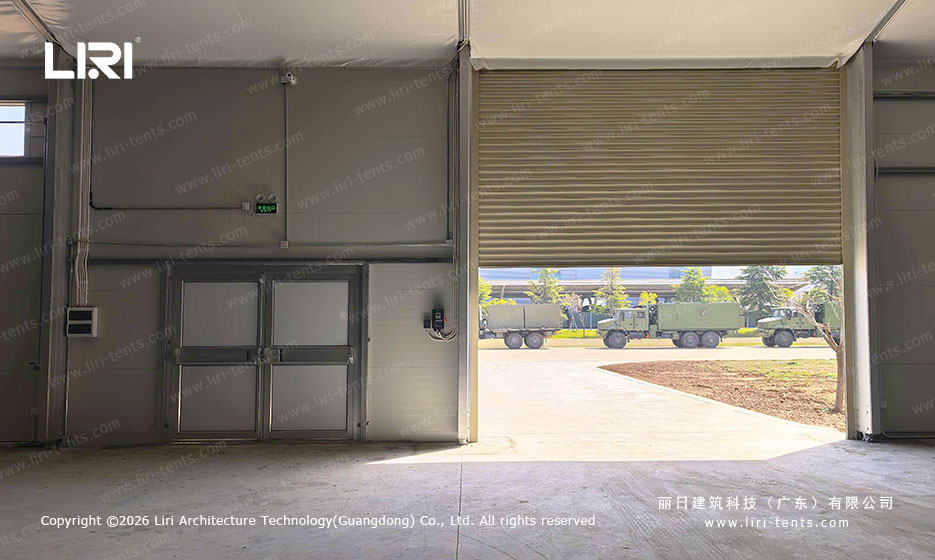 Aircraft hangar roll up door opening for vehicle access