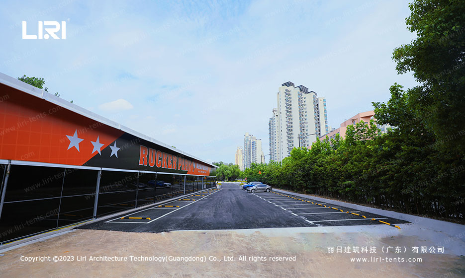 city badminton hall tent installation completed in commercial district with branding