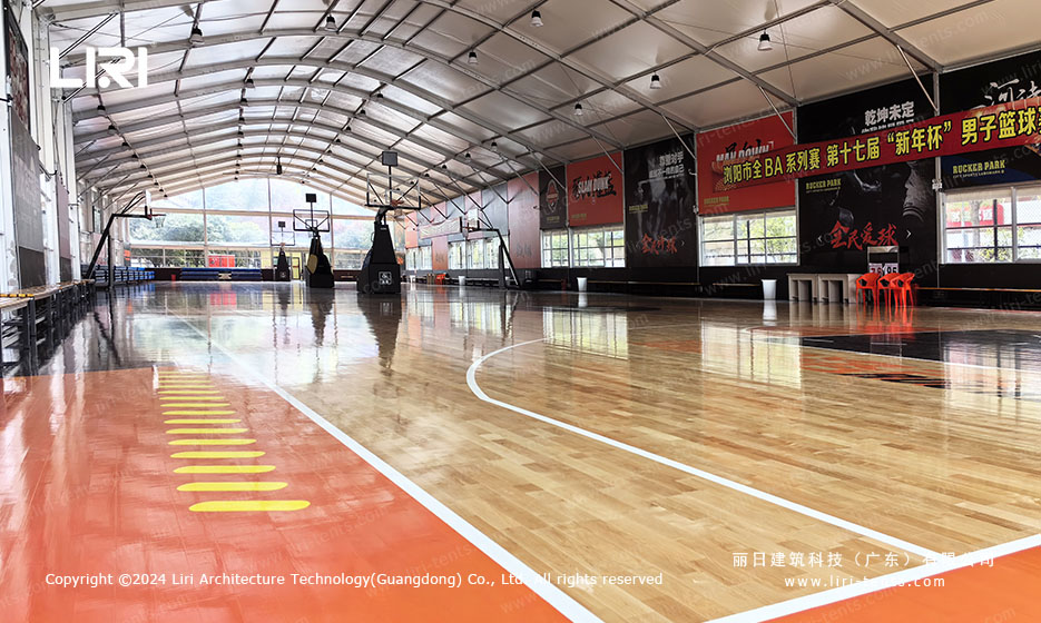 Clear span basketball hall with arcum roof and natural lighting