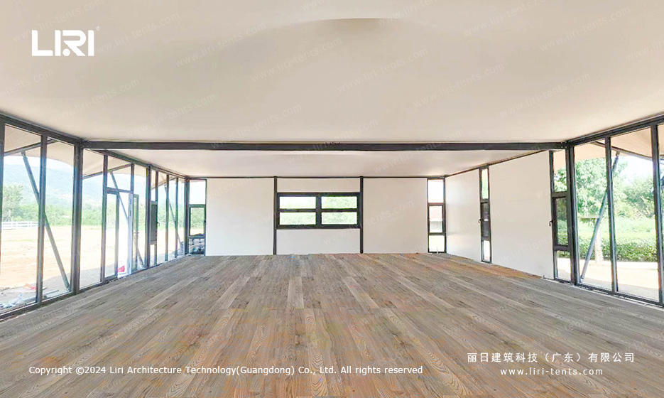 Clear span event tent interior with wooden flooring
