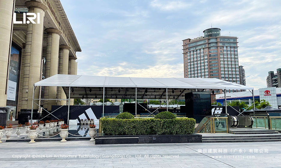 Clear span tent at Shanghai plaza with mall entrance backdrop