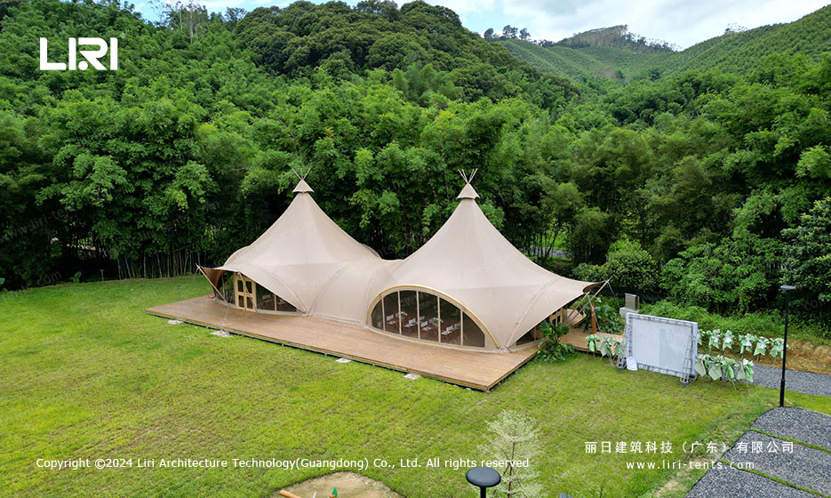 double peak tension membrane glamping tent aerial view
