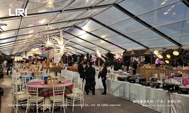 Gala banquet setup inside large clear span event tent