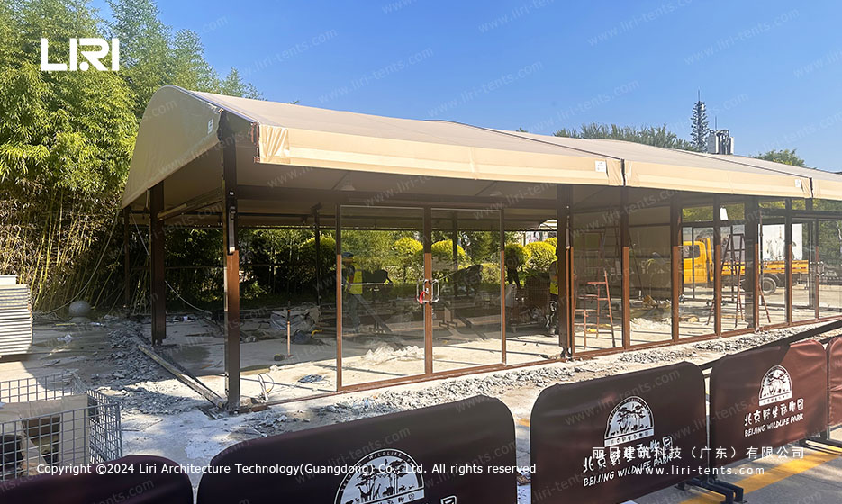 glass walled zoo tent with aluminum frame and curved roof