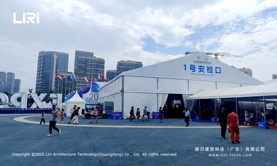 Front view of A-frame large event tent checkpoint 1 at busy Hainan trade show entry