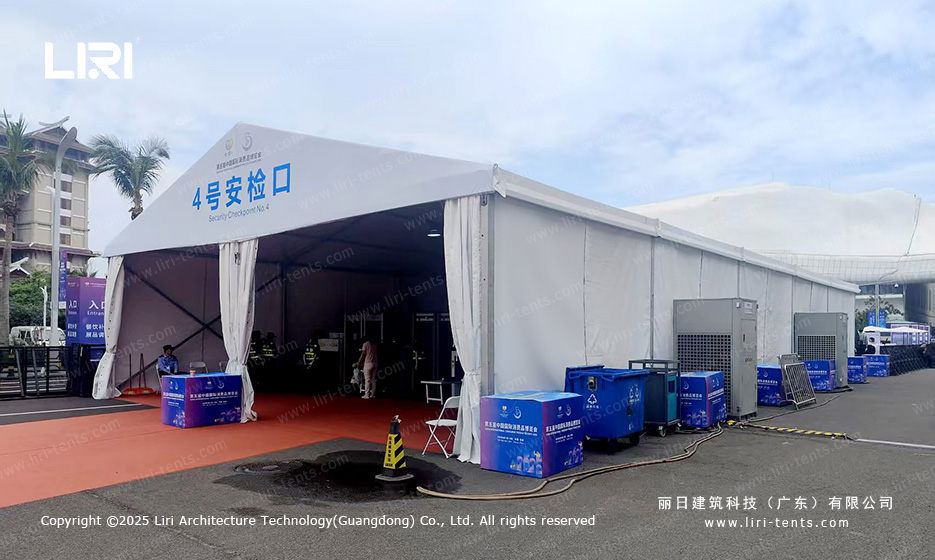 Side view of A-frame security checkpoint tent 4 at Hainan exhibition with HVAC units outside