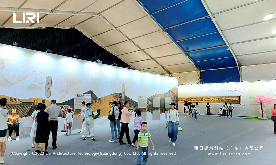 Modular aluminum frame joints supporting the clear span exhibition tent structure