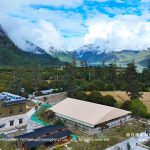 Mountain event tent aerial view over equestrian arena