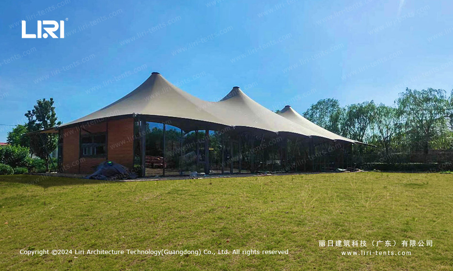 Mountain resort tent view with clear span canopy