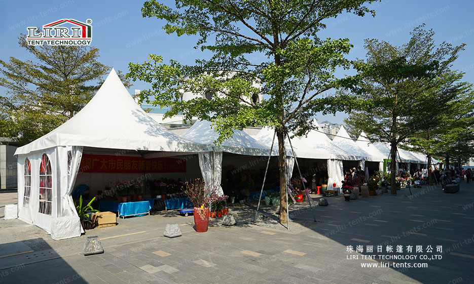 Mini pagoda tents in the commercial pedestrian streets can be used for booths, ticket booths, and lounges, in various sizes such as 10x10, etc. Rental service is available, welcome to inquire.