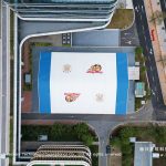 top down view of sports event tent between office buildings