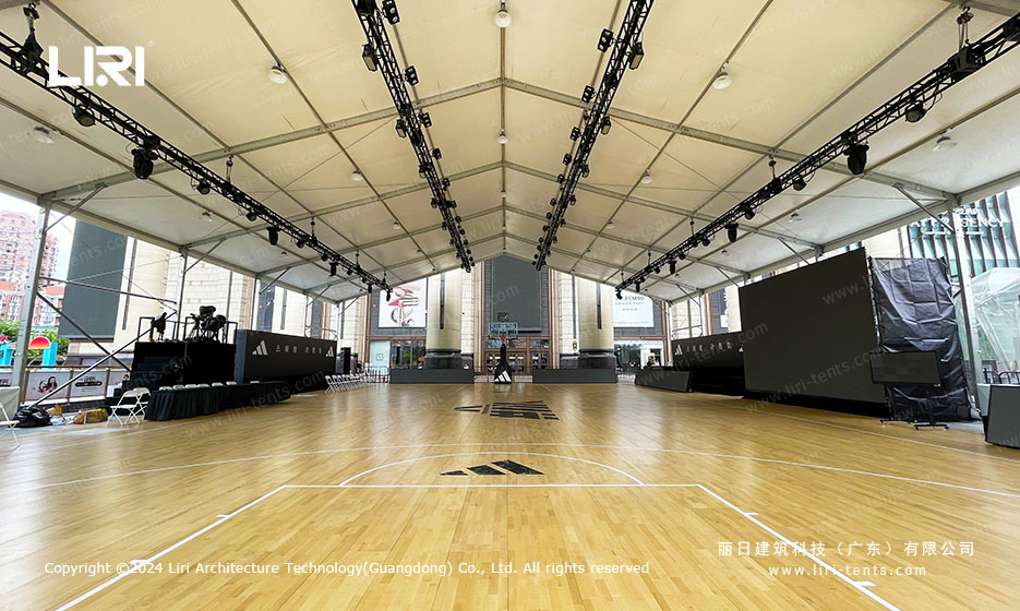 Wide clear span tent for basketball event without interior poles