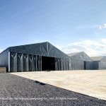 Temporary clear span hangar tent for aircraft storage
